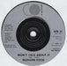 Norman Cook – Won't Talk About It / Blame It On The Bassline 7" vinyl record, image 3 of 4