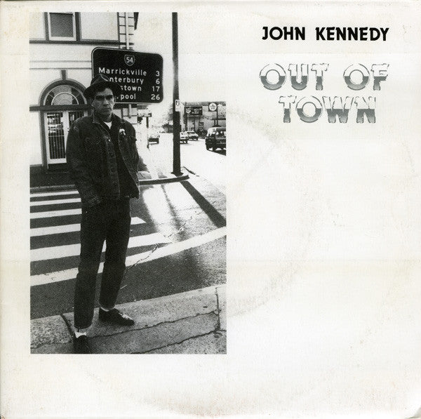 John Kennedy – Out Of Town 7" vinyl record, image 1 of 4