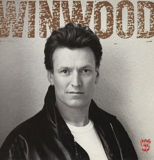 Steve Winwood – Roll With It LP vinyl record, image 1 of 6