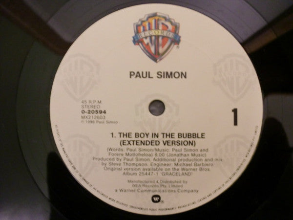 Paul Simon – The Boy In The Bubble 12" vinyl record, image 6 of 7