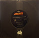 Jerry Harrison: Casual Gods – Man With A Gun 7" vinyl record, image 1 of 2
