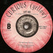 Curious (Yellow) – Taken By Surprise 7" vinyl record, image 4 of 4