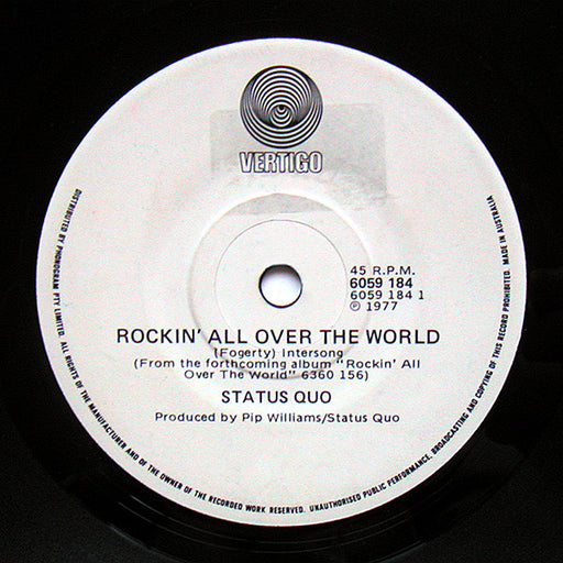 Status Quo – Rockin' All Over The World 7" vinyl record, image 1 of 2