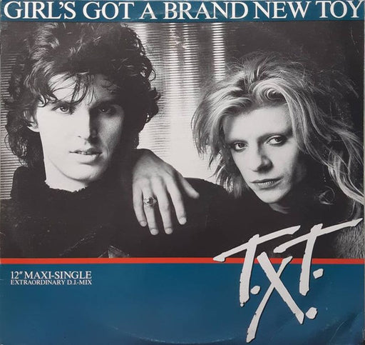 T.X.T. – Girl's Got A Brand New Toy 12" vinyl record, image 1 of 2