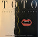 Toto – Stranger In Town 12" vinyl record, image 1 of 4