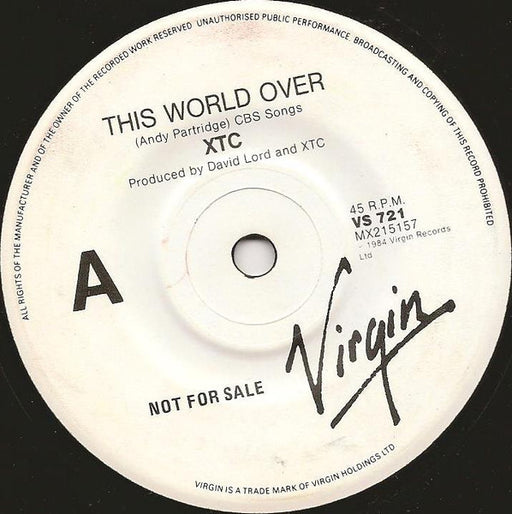 XTC – This World Over 7" vinyl record, image 1 of 3