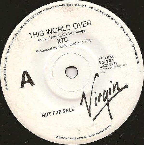 XTC – This World Over 7" vinyl record, image 1 of 3
