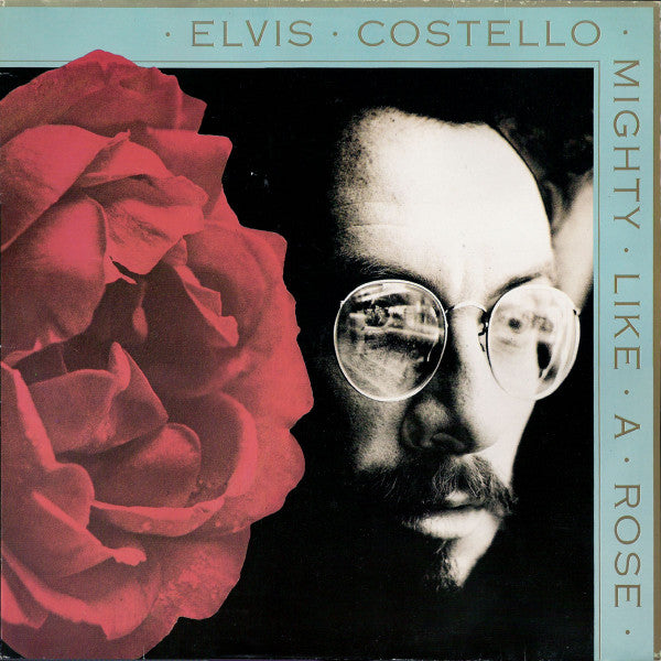 Elvis Costello – Mighty Like A Rose LP vinyl record, image 1 of 7
