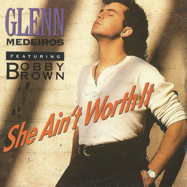 Glenn Medeiros, Bobby Brown – She Ain't Worth It 7" vinyl record, image 1 of 4