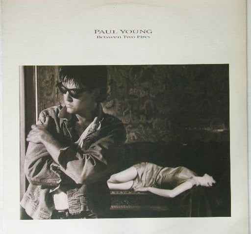 Paul Young – Between Two Fires LP vinyl record, image 1 of 5
