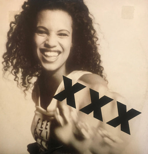 Neneh Cherry – Kisses On The Wind 12" vinyl record, image 1 of 4