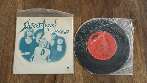 Street Angel – Caught In The Act 7" vinyl record, image 1 of 2