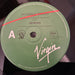 Genesis – Invisible Touch 7" vinyl record, image 4 of 4