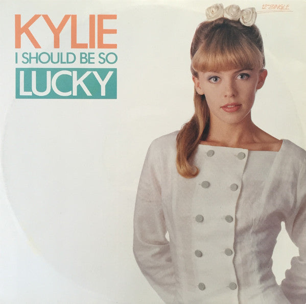 Kylie Minogue – I Should Be So Lucky