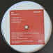 Oxia – Domino Remixes 12" vinyl record, image 1 of 3