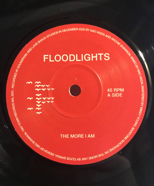 Floodlights – The More I Am / Overflowing Cup 7" vinyl record, image 3 of 4