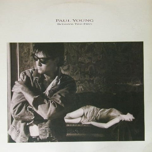 Paul Young – Between Two Fires (LP, Vinyl Record Album)